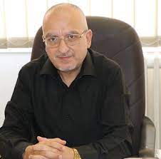 Portrait of author Ashraf El Dabaen